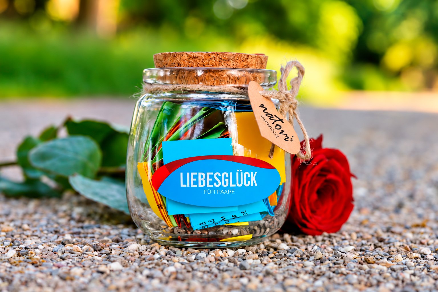 Liebesglück jar with a red rose